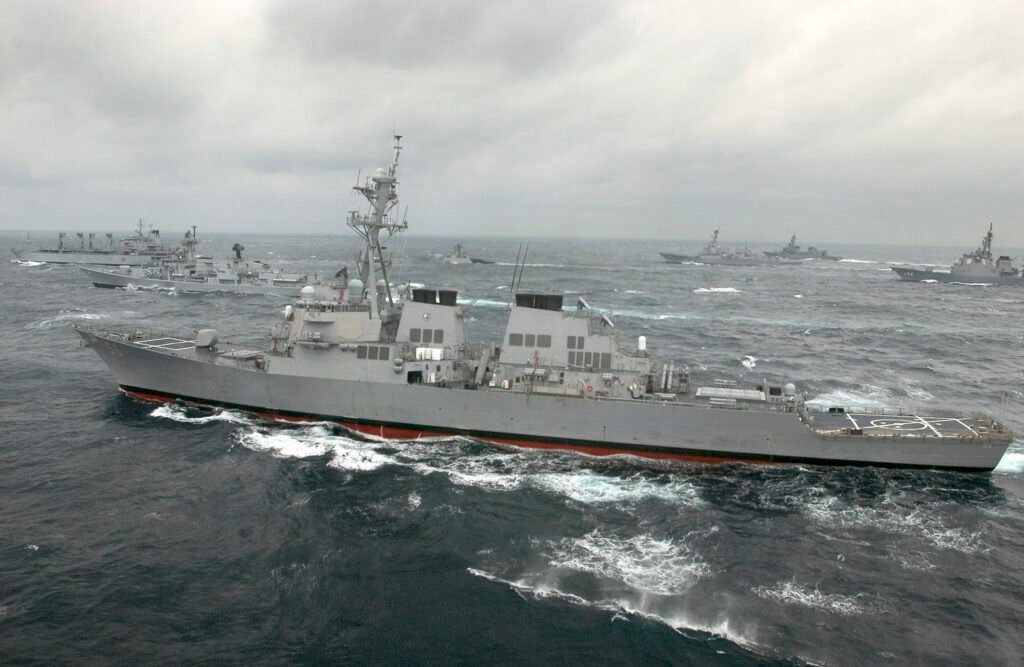 The US Navy Arleigh Burke-class guided-missile destroyer USS JOHN S. MCCAIN, Russian Navy destroyer ADMIRAL VINOGRADOV record rough confrontation in Japan Sea